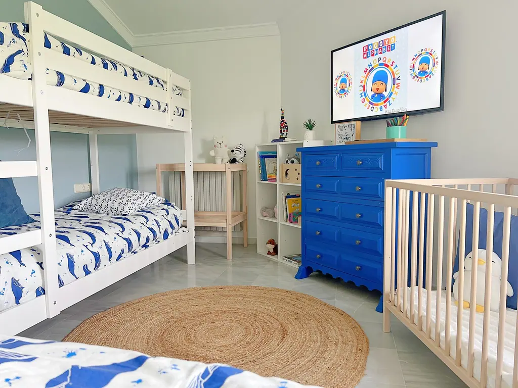 Habitación de los niños de Villa Paula, con literas y cuna
